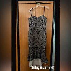 Beautiful strapless dress laced black, cream, and pink.